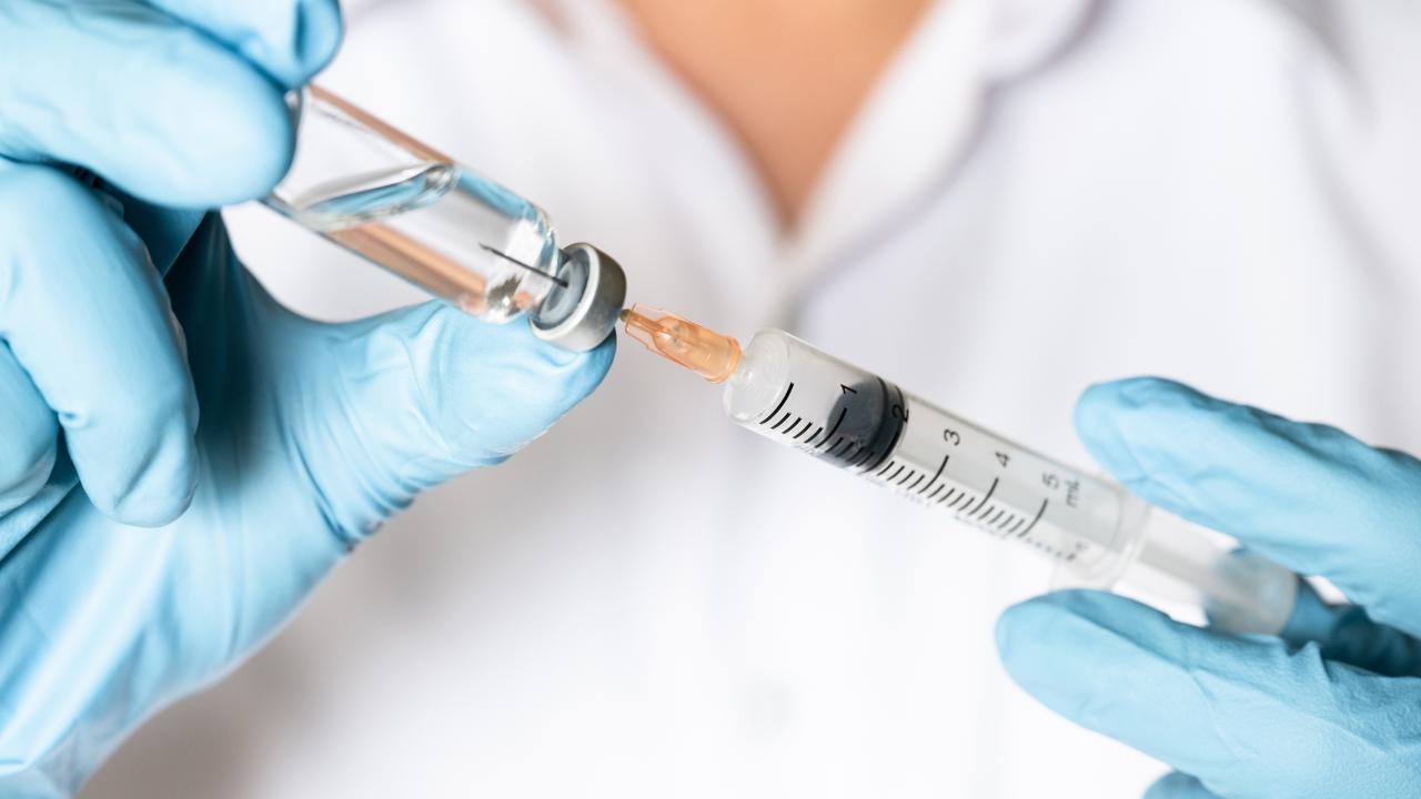 Needle in vaccine vial